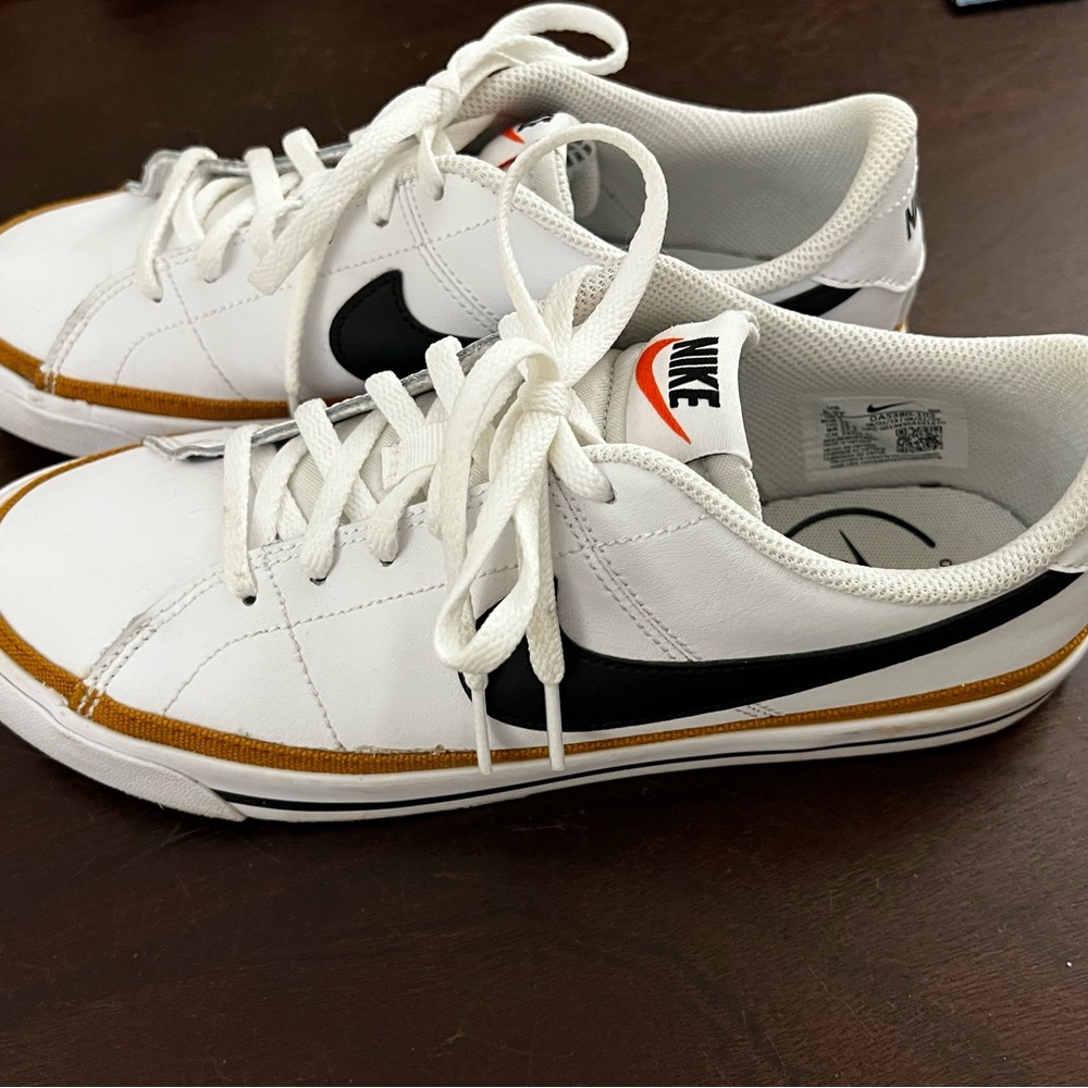 Nike White Sneakers with Black Swoosh